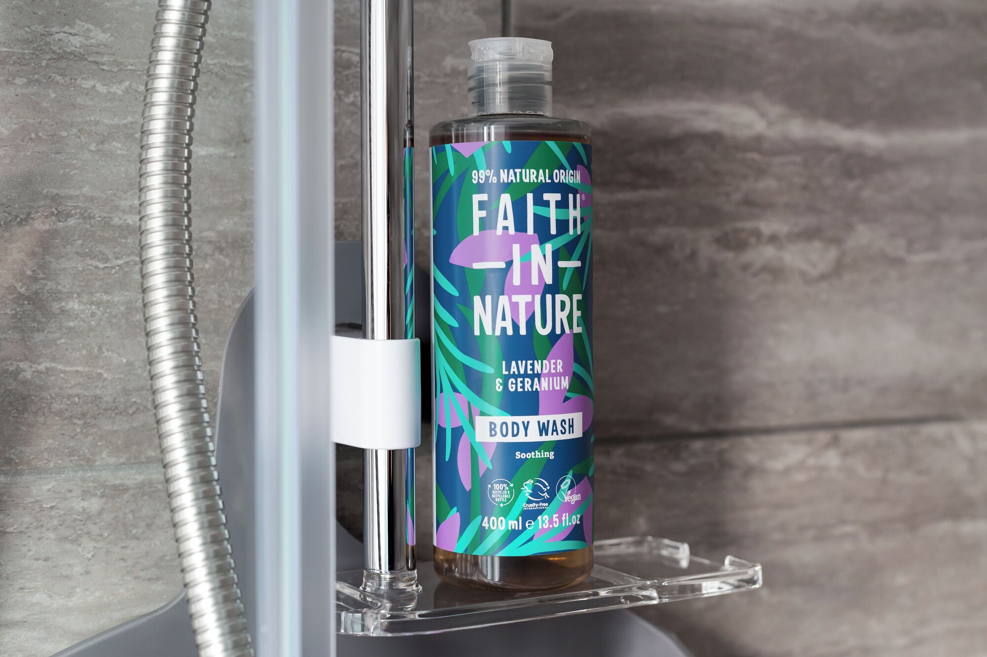 A bottle of Faith-In-Nature body wash on a bathroom shelf.