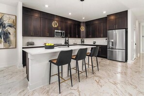 Fridge, microwave, oven, stovetop - The Ritzy |Breathtaking NEW Home w/ PVT Pool & 2 Themed BRs in Dream Location (Orlando)