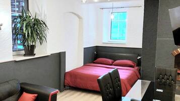 Design-studiosviitti | Ilmainen Wi-Fi, vuodevaatteet