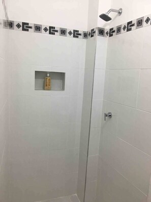 Shower, towels, soap, shampoo