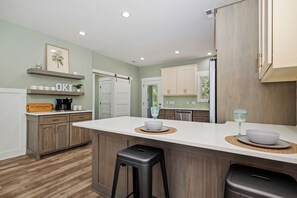 Fridge, microwave, oven, stovetop - Heads Carolina: Modern Home with Private Pool in Quiet Neighborhood (Oak Island)