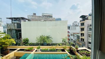 Deluxe Studio, Balcony, City View | Desk, laptop workspace, iron/ironing board, free WiFi