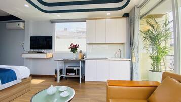 Deluxe Studio, Balcony, City View | Desk, laptop workspace, iron/ironing board, free WiFi