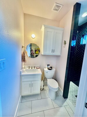 Hair dryer, towels, soap, shampoo