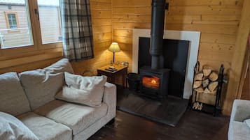 Cabin | Living area | TV, fireplace