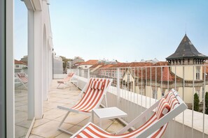 Departamento superior, balcón, vista a la ciudad | Balcón