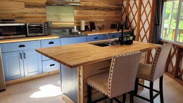 Microwave, stovetop, coffee/tea maker, cookware/dishes/utensils