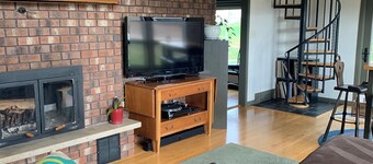 Our Thunder Moon Farm Stay- sleeps 7, framed by wildflowers. 4 miles to GB.