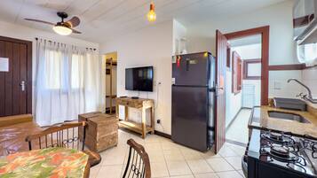 Apartment, 1 Bedroom | Living area | 32-inch LED TV with satellite channels