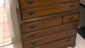 A wooden dresser with multiple drawers and a flat-screen TV on top. - Private 1-bedroom apartment, 15 minutes to Manhattan, NYC bus at the door (Union City)