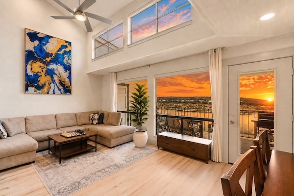 Watch the sun rise over Lake Travis from the living room or either of the privat