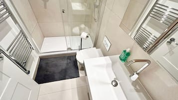 Eco-friendly toiletries, hair dryer, towels