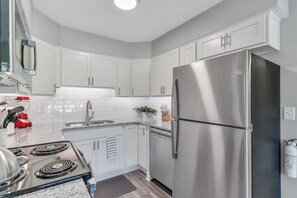 The kitchen has a blender, slow cooker, hand mixer plus so much more!