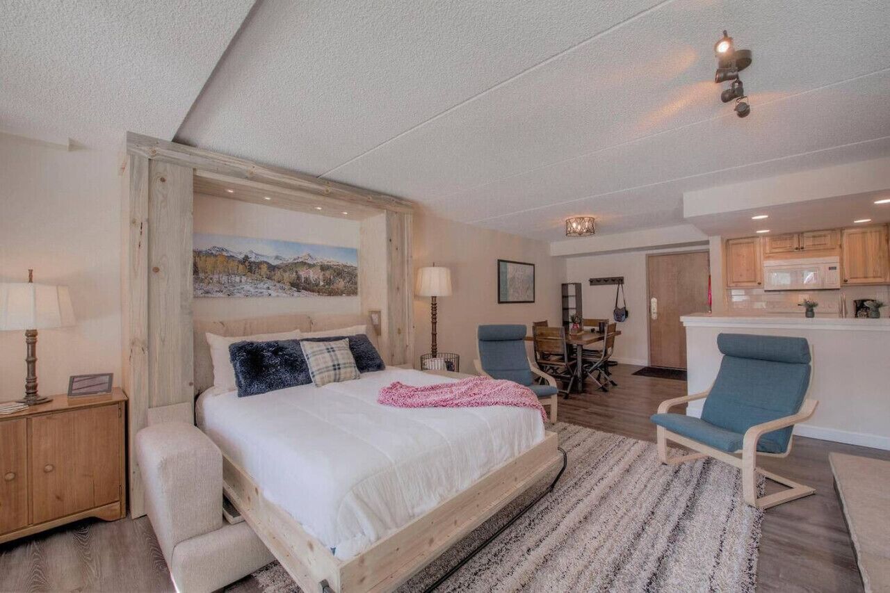 1 bedroom, desk, iron/ironing board, travel crib