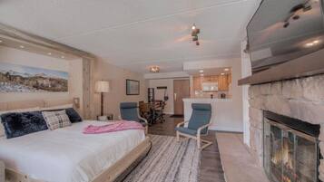 1 bedroom, desk, iron/ironing board, travel crib