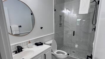 Hair dryer, towels, soap, toilet paper