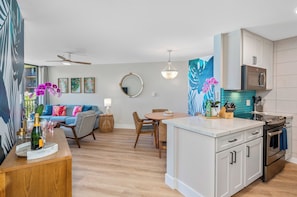 Luxury Condo, Ocean View | Living area | Smart TV