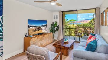 Luxury Condo, Ocean View | Living area | Smart TV