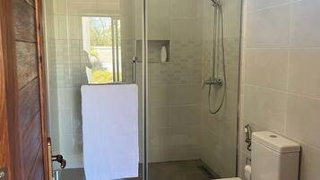 Shower, hair dryer, towels, soap