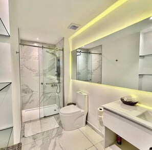 Shower, hair dryer, towels, soap