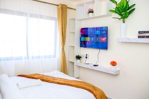 1 chambre, fer et planche à repasser, Wi-Fi, draps fournis