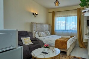 1 غرفة نوم ومكواة/لوح كي وواي فاي وملاءات أسرّة