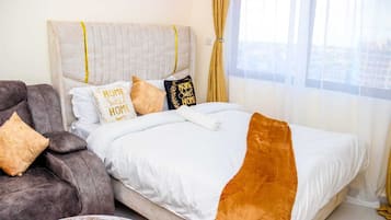 1 slaapkamer, een strijkplank/strijkijzer, wifi, beddengoed