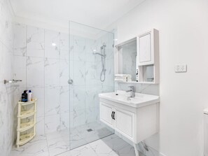 Hair dryer, towels, soap, shampoo