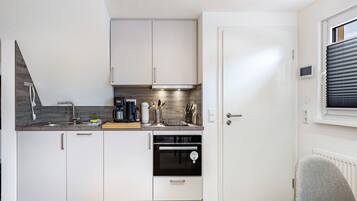 Réfrigérateur, four, plaque de cuisson, lave-vaisselle