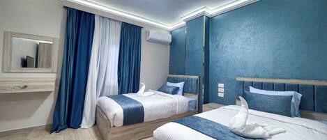 1 sovrum, sängtillbehör av högsta kvalitet, minibar och skrivbord