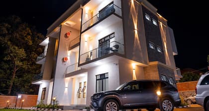 Q-Plus Apartments