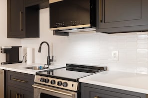 Fridge, microwave, oven, stovetop - Updated Studio Condo near Main Street!! Garage Parking!! (Frisco)