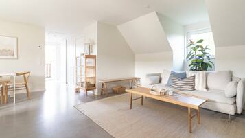 Apartment, 3 Bedrooms, Garden View | Living area | 40-inch Smart TV with digital channels