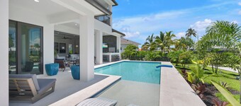 2024 4 Bed Home (Option- Golf Carts Rental) (Car rental option)- Water view with Heated Pool , Outdoor Kitchen/Bar