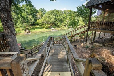 Cozy Riverfront Cabin with Private Dock
