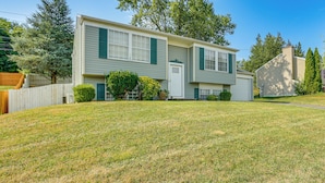A two-story house with a front yard and a garage. - 5 Mi to Downtown Harrisburg - Family Home! (Harrisburg)