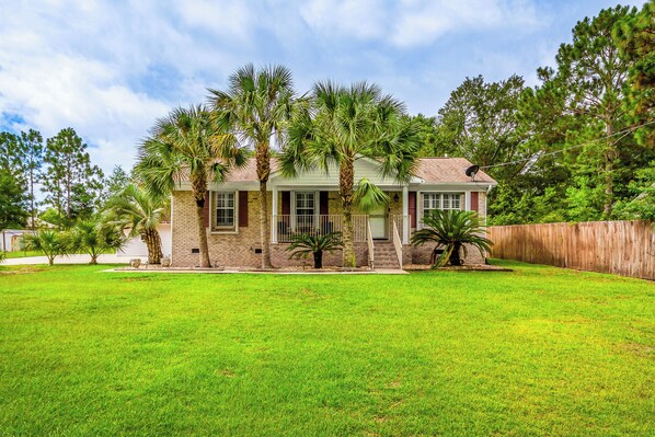 Front of property - Navarre Home w/ Palm Tree Views ~ 4 Mi to Beach! (Navarre)