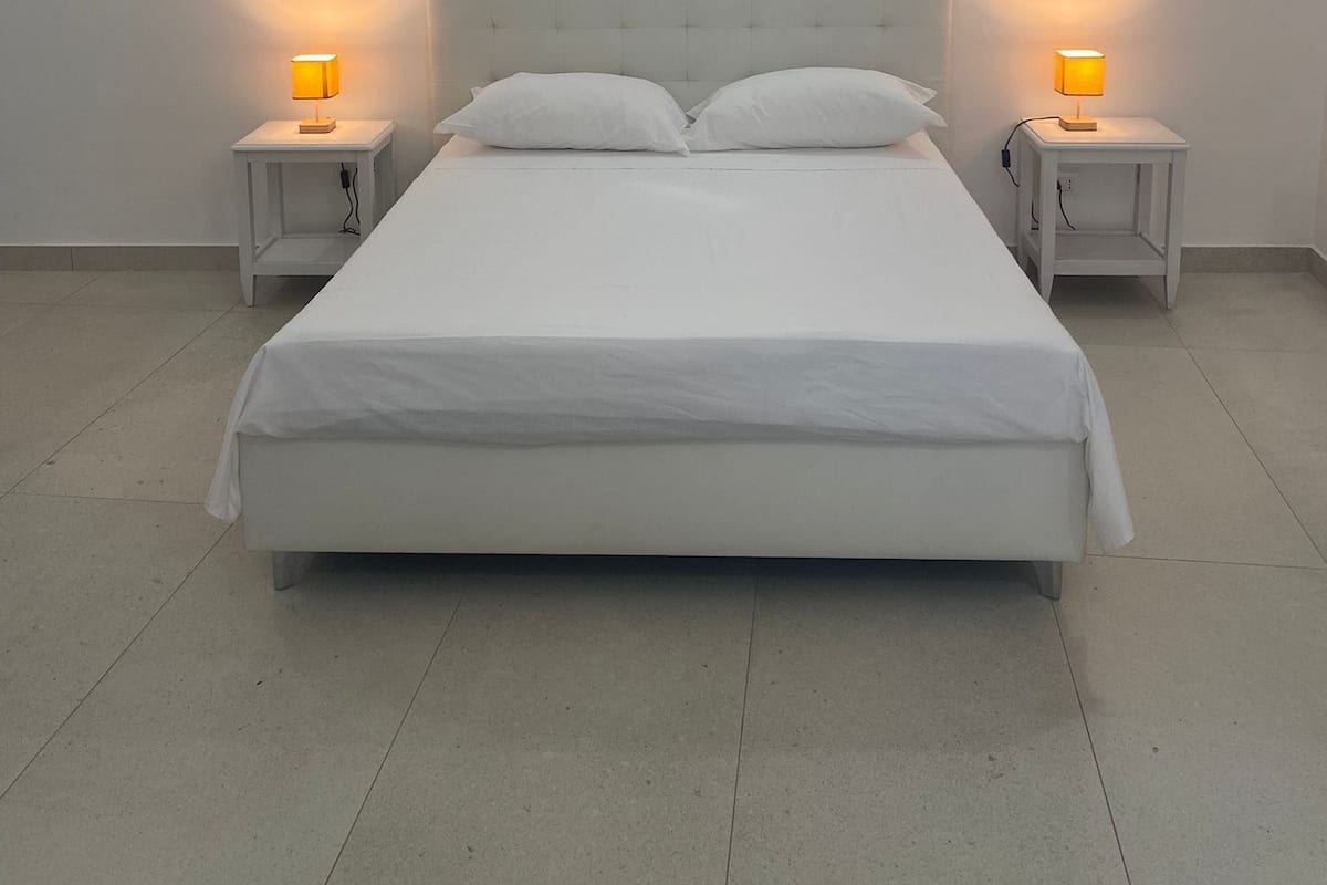 Family Quadruple Room, 1 Queen Bed with Sofa bed, Private Bathroom, Ground Floor | Premium bedding, pillowtop beds, minibar, desk