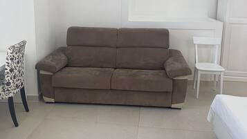 Familjerum för fyra - 1 queensize-säng med bäddsoffa - privat badrum - bottenvåning | Extrasängar