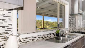 Microwave, oven, dishwasher, dining tables