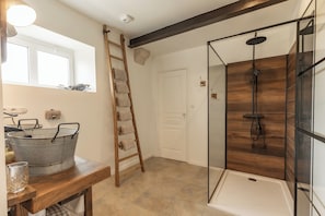 Shower, hair dryer, towels, soap