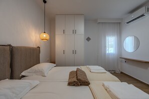 2 slaapkamers, een kluis op de kamer, een strijkplank/strijkijzer