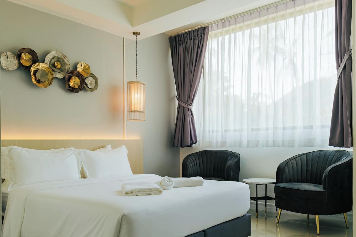 Premium bedding, down duvets, pillow-top beds, free minibar