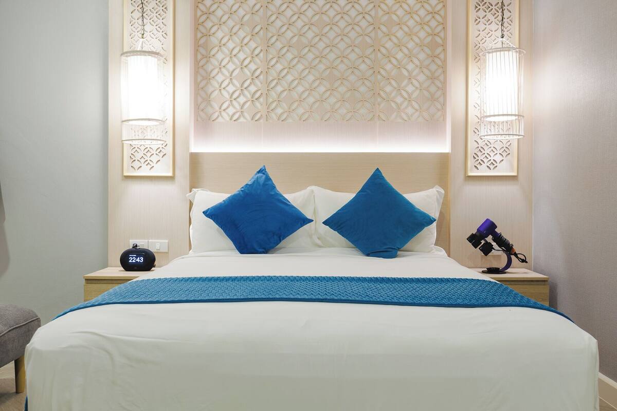 Premium bedding, down comforters, pillowtop beds, free minibar