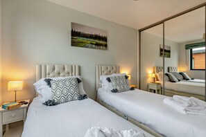 2 quartos, berço de viagem, Wi-Fi de cortesia, roupa de cama