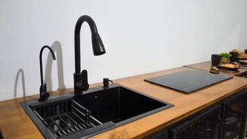 Fridge, microwave, stovetop, coffee/tea maker