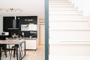 Fridge, microwave, stovetop, coffee/tea maker