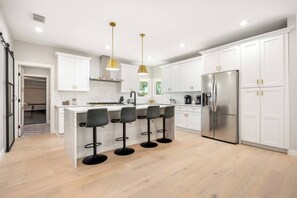 Fridge, microwave, oven, stovetop - Luxe Home w/ Pool and Hot Tub on 7 acres (Dripping Springs)