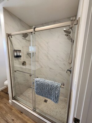 Shower, hair dryer, towels, soap