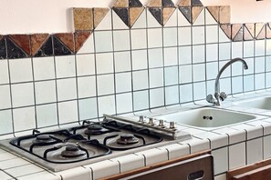 Fridge, oven, dining tables